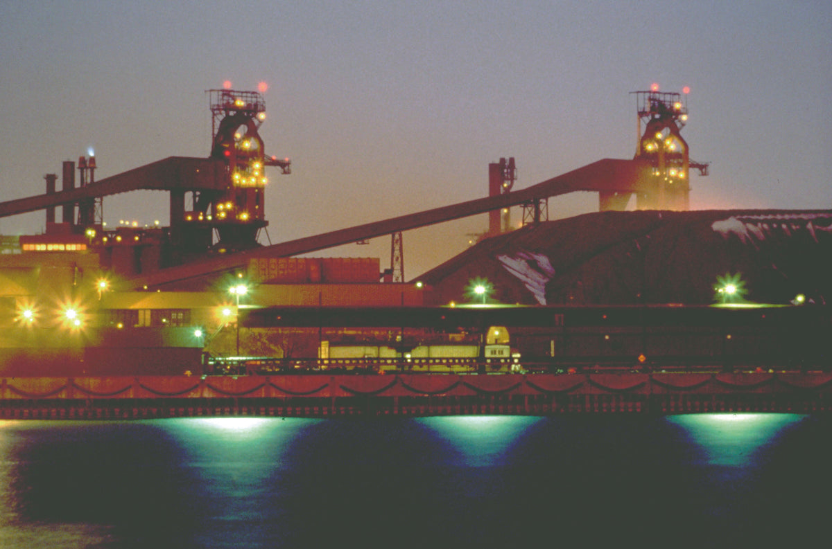 Steel mill at night photograph